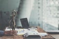 Lawyer holding Scales of Justice of set up desk in office. Law, legal services, advice, Justice concept. Royalty Free Stock Photo