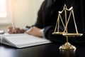 lawyer judge reading documents at desk in courtroom Royalty Free Stock Photo