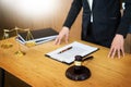 Lawyer judge reading documents at desk in courtroom working on w Royalty Free Stock Photo