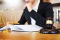 Lawyer judge reading documents at desk in courtroom working on w Royalty Free Stock Photo