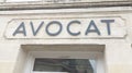 Lawyer means avocat text sign french on wall building counsel entrance solicitor in France