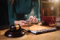 Lawyer office. gavel of Justice with scales and lawyer working on a laptop Royalty Free Stock Photo