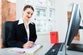 Lawyer in office sitting on the computer Royalty Free Stock Photo