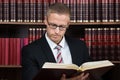 Lawyer Reading Book At Courtroom Royalty Free Stock Photo