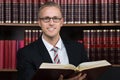 Lawyer Reading Book At Courtroom Royalty Free Stock Photo