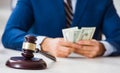 Lawyer receiving money as bribe Royalty Free Stock Photo