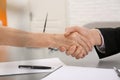 Lawyer shaking hands with client in office Royalty Free Stock Photo