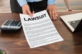 Lawyer Showing The Lawsuit Document Royalty Free Stock Photo