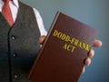 Lawyer shows Dodd-Frank act in the hands. Royalty Free Stock Photo