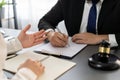 Lawyers signing contract in law firm office concept. Equilibrium Royalty Free Stock Photo