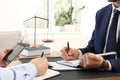 Lawyer working with client at table in offic Royalty Free Stock Photo