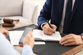 Lawyer working with client at table in office Royalty Free Stock Photo