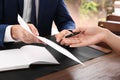 Lawyer working with client at table in office Royalty Free Stock Photo