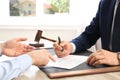 Lawyer working with client at table in office Royalty Free Stock Photo