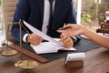 Lawyer working with client at table in office Royalty Free Stock Photo