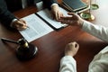 Lawyer working with contract client on the table in office. consultant lawyer, attorney, court judge, concept Royalty Free Stock Photo