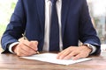 Lawyer working with documents at table