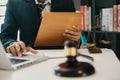 Lawyer working with paperwork on his desk in office workplace for consultant lawyer in office Royalty Free Stock Photo