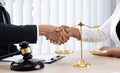 Lawyers or counselors join hands with clients to congratulate the end of the case by the company Royalty Free Stock Photo