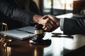 A lawyers handshake seals a successful business partnership meeting