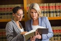 Lawyers talking in the law library