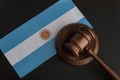 Lawyers wooden gavel on Argentina flag background. Court in Argentina Royalty Free Stock Photo