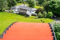 The Laxey Wheel also known as Lady Isabella is built into the hillside above the village of Laxey in the Isle of Man. It is the Royalty Free Stock Photo