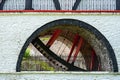 The Laxey Wheel also known as Lady Isabella is built into the hillside above the village of Laxey in the Isle of Man. It is the Royalty Free Stock Photo