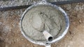 Lay bricks with cement mixing tub, mortar concrete Royalty Free Stock Photo
