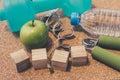 Lay Flat - Dumbbell, Fresh Apple, Measuring Tape, Mineral Water, Hand grip & Blank Wooden Cubes, customizable for New Year. Royalty Free Stock Photo