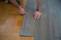 Lay vinyl floor on parquet floor Royalty Free Stock Photo