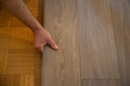 Lay vinyl floor on parquet floor Royalty Free Stock Photo