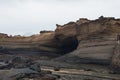 A layer of black rock stone near the sea Royalty Free Stock Photo