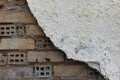 Layer of broken plaster old wall