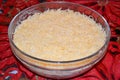 Layer of grated hard cheese in a glass bowl