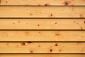 Layer of natural pine wood planks strips wall background texture wide with natural eyelets and grunge Royalty Free Stock Photo