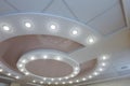 Layered ceiling with embedded lights and stretched ceiling inlay Royalty Free Stock Photo