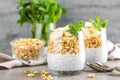 Layered chia pudding parfait with banana, sweet wheat with honey and yogurt