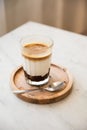 Layered Coffee Drink on wooden plate