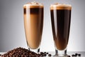 Layered Coffee Drinks in Tall Glasses with Coffee Beans on a Gray Background