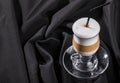 Layered coffee, fabric folds background