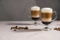 Layered coffee latte drinks. Hot coffee drinks in glass mugs, copy space Royalty Free Stock Photo