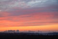 layered colorful sky over city park at cold dawn Royalty Free Stock Photo