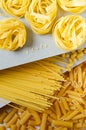 Layered composition with different types of pasta