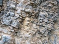 Layered empty rock, limestone, sandstone, slate formation background, texture. Copy space