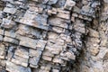 Layered empty rock, limestone, sandstone, slate formation background, texture. Copy space