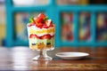layered fruit pudding in glass cup