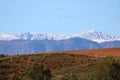 Layered hills and mountains with snow