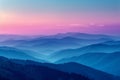 Layered mountains in a colorful sunset Royalty Free Stock Photo