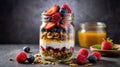 Healthy Breakfast Parfait with Granola, Yogurt and Fresh Berries in a Glass Jar Royalty Free Stock Photo
